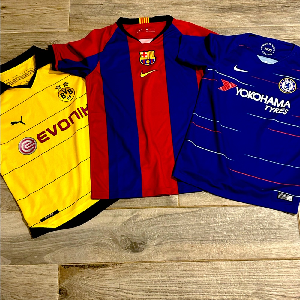Three boys soccer jerseys